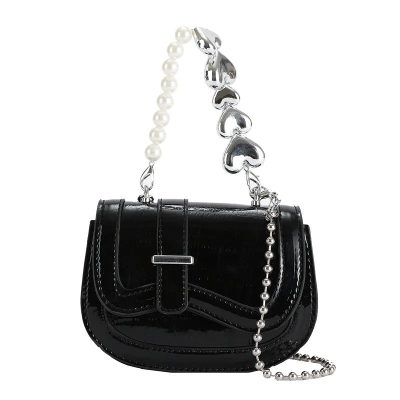 Mini crossbody bag in PU leather with mobile phone pocket, shown in silver colour with horizontal square design
