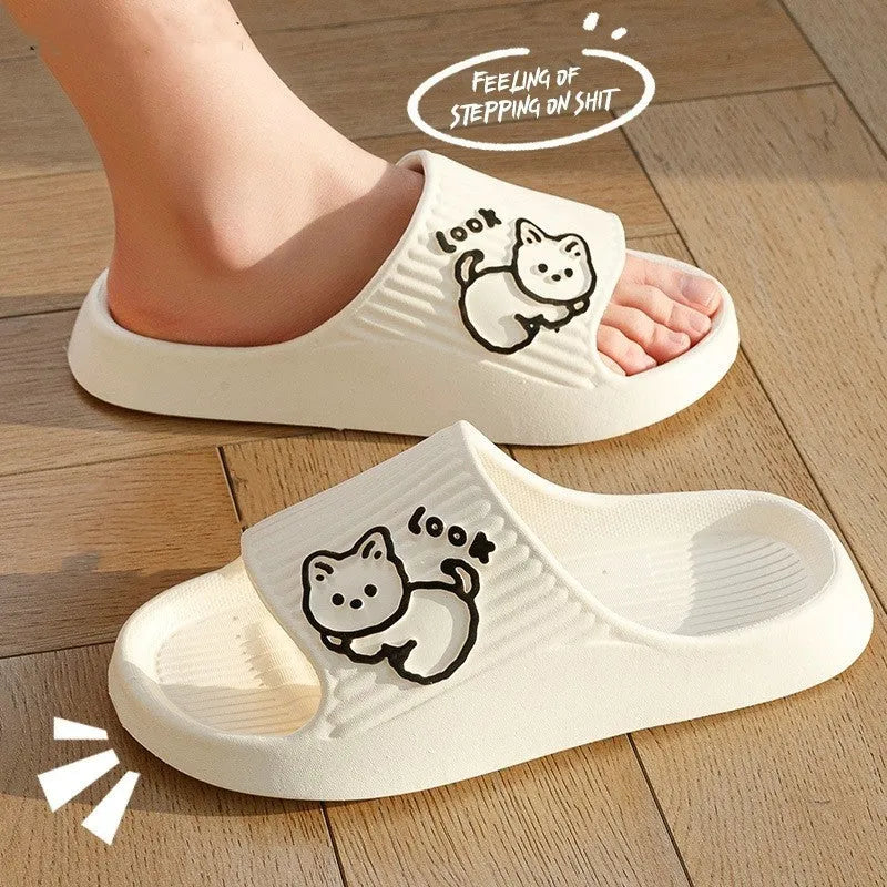 Women's green EVA flip-flop slippers with cute cat design and thick platform sole.