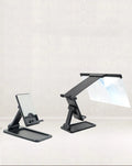 Black folding mobile phone screen amplifier with detachable holder showing 12-inch curved magnifier