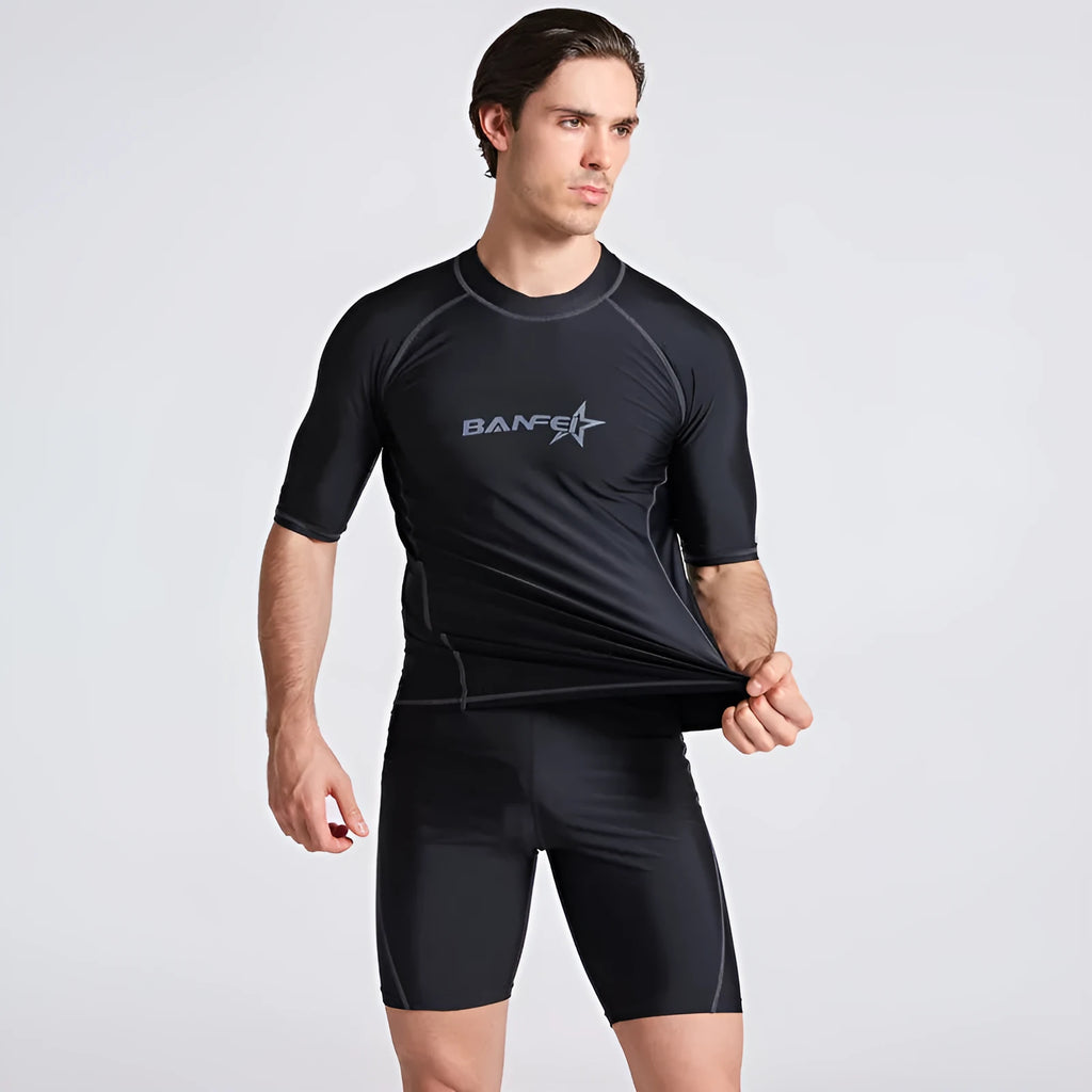 Men's quick-drying half sleeve swimsuit in blue with separate top and pants for snorkelling and surfing