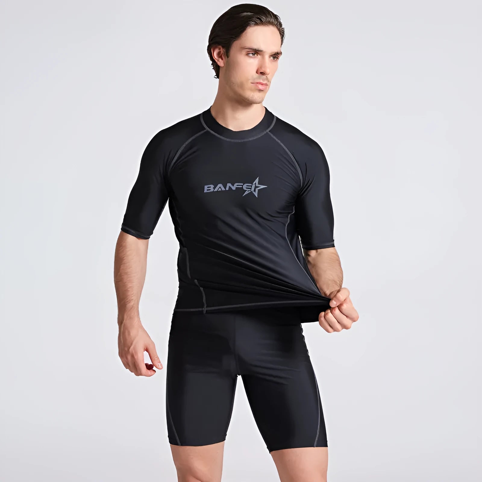 Men's quick-drying half sleeve swimsuit in blue with separate top and pants for snorkelling and surfing