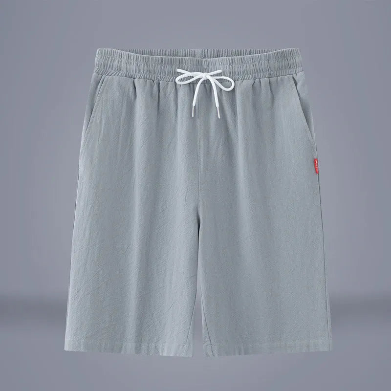 Solid colour cotton-linen cropped pants with a drawstring waist, shown in Army Green.