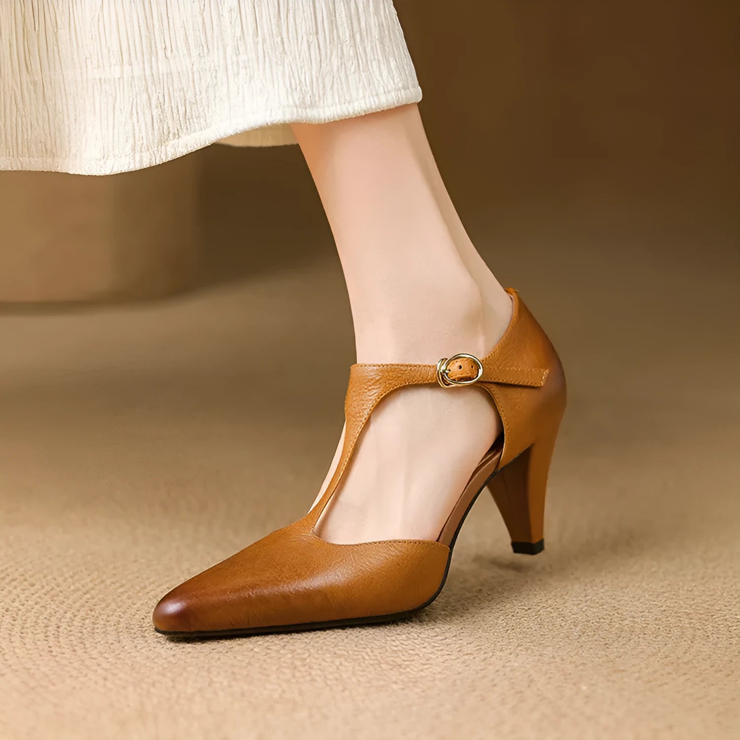 Brown retro women's T-strap sandals with closed toe, chunky block heel, and buckle fastening