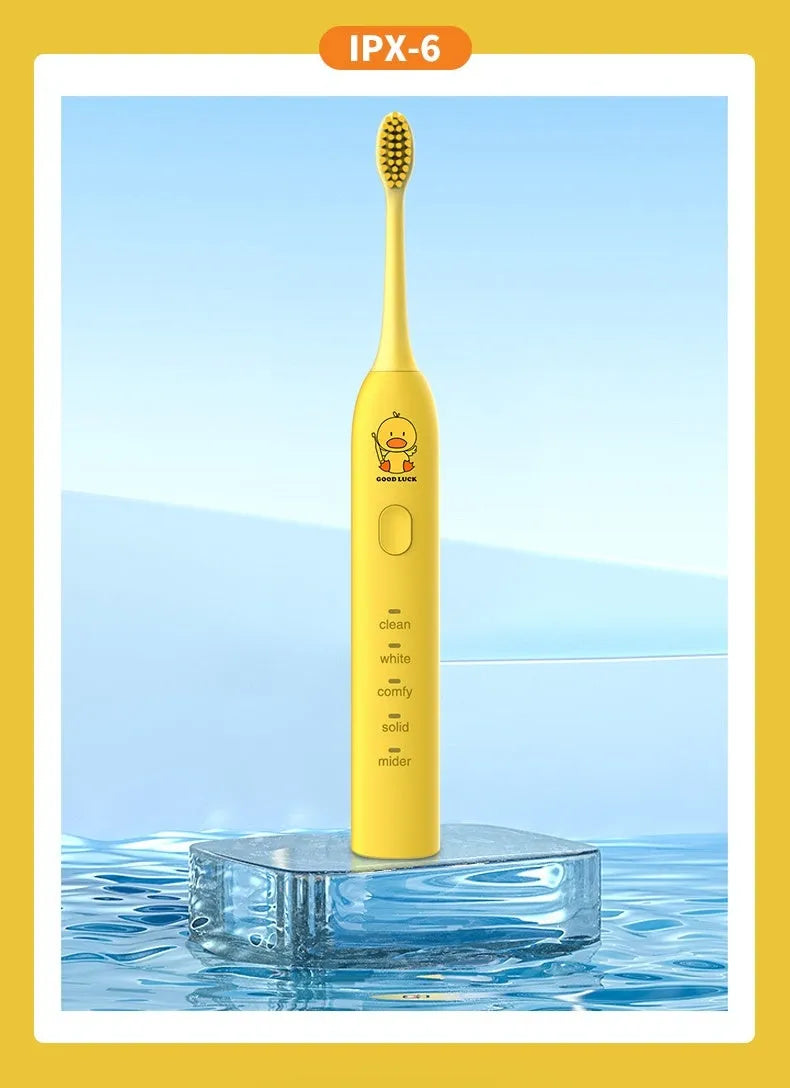 Yellow USB rechargeable electric toothbrush with soft bristles and duck laser engraving design