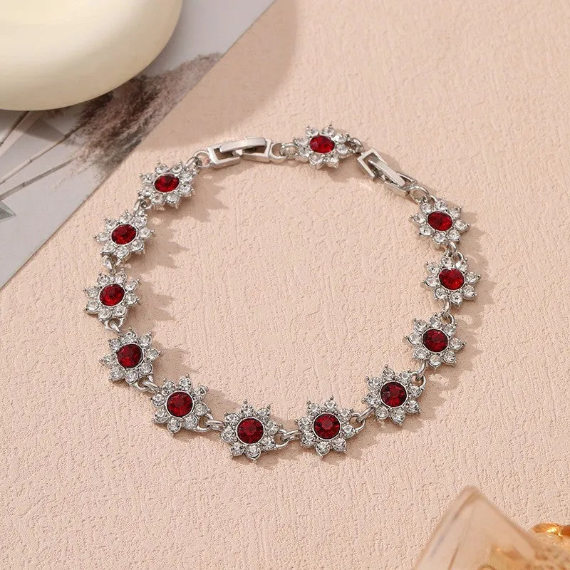 Flower-shaped electroplated bracelet in zinc alloy with colourful crystal accents