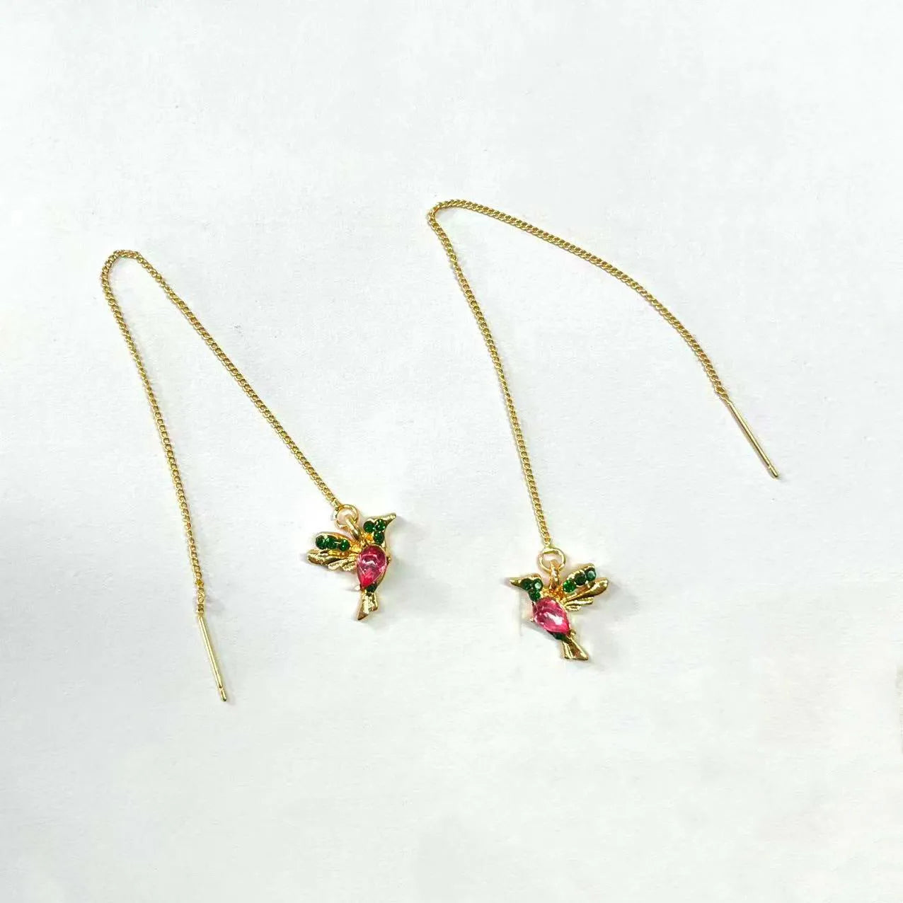 Long hanging earrings with bird decoration featuring mixed zirconium wings on alloy chains