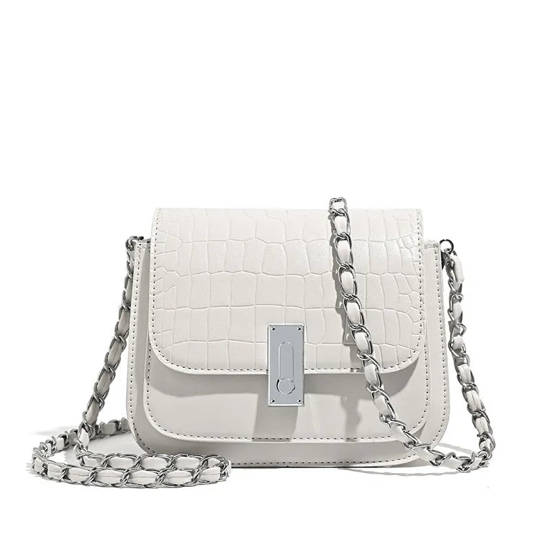 Women's black PU leather shoulder bag with chain strap showing internal phone pocket