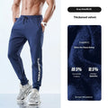 Men's black ankle-tied sweatpants with elasticated cuffs, shown laid flat.