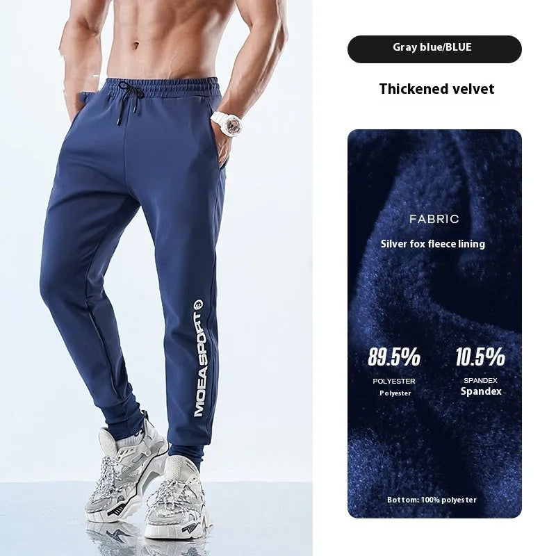 Men's black ankle-tied sweatpants with elasticated cuffs, shown laid flat.