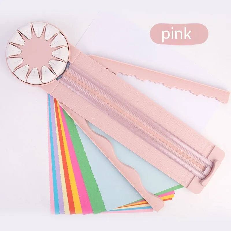 Pink and black plastic paper cutting machine with dotted guides and 12 cutting functions
