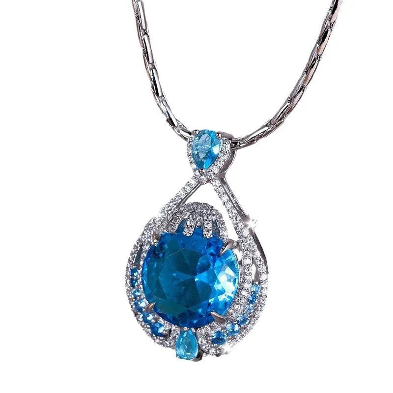 Blue geometric women's necklace with fireworks cut pendant on water wave chain