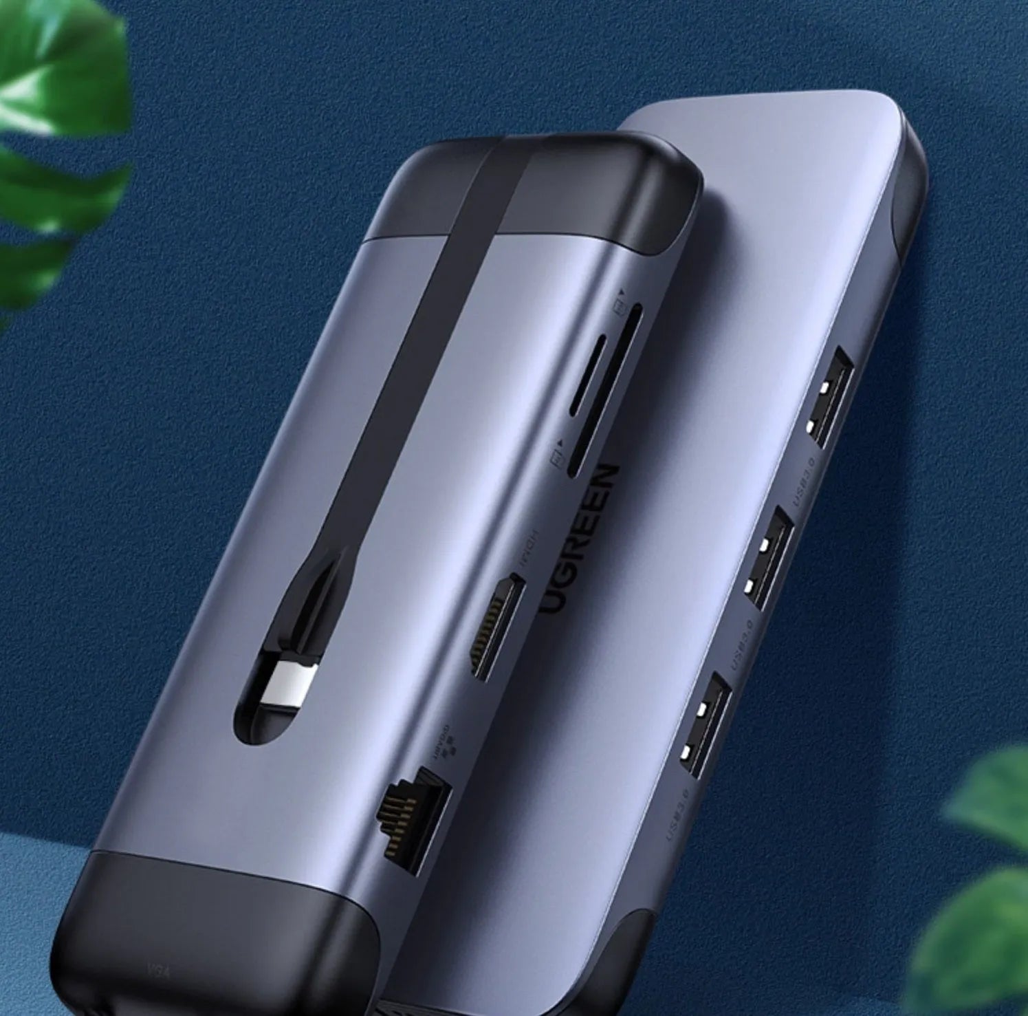 USB-C docking station showing HDMI, USB 3.0, VGA, and ethernet ports on a 9-in-1 model with short connecting cable.