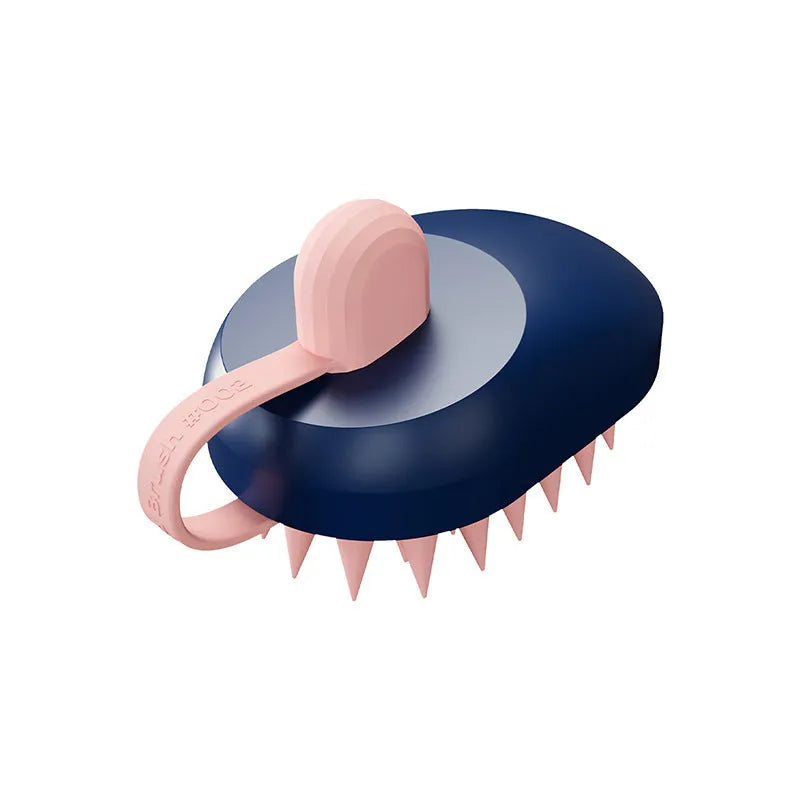 Soft silicone handheld pet hair remover and massage brush in dark blue on a white background.