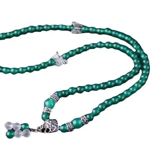 Natural green agate chain multi-layer bracelet with 6mm beads on a woman's wrist