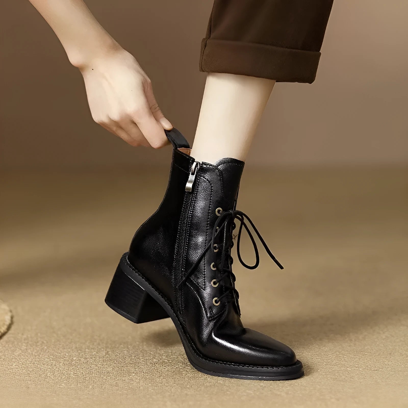 Women's black pointed-toe ankle boots with 5.5cm heel and 13cm shaft height