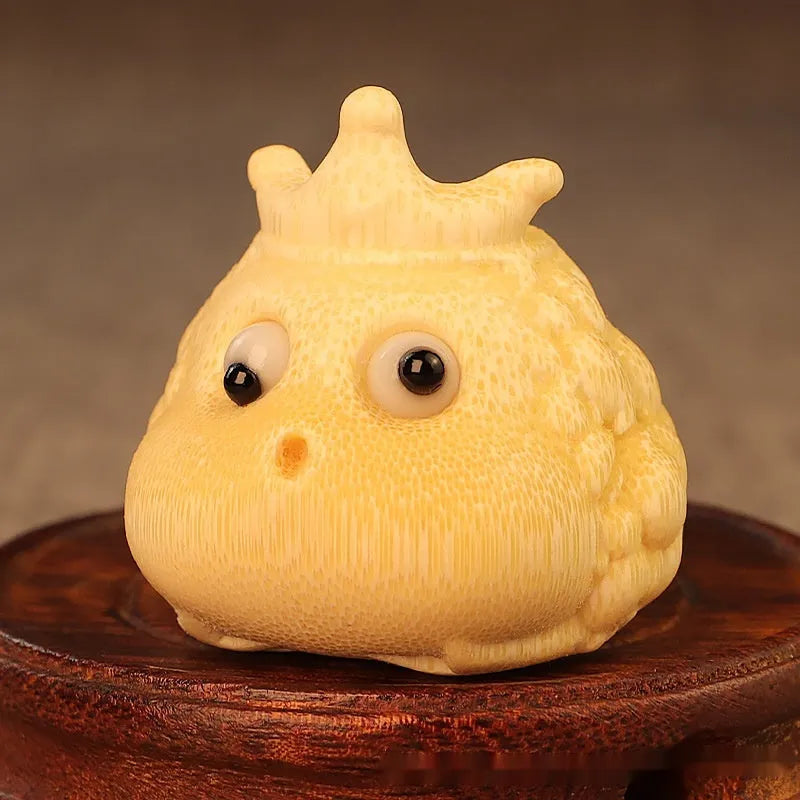 Solid bamboo carving of a Crown Princess Toad hand ornament in cute style.