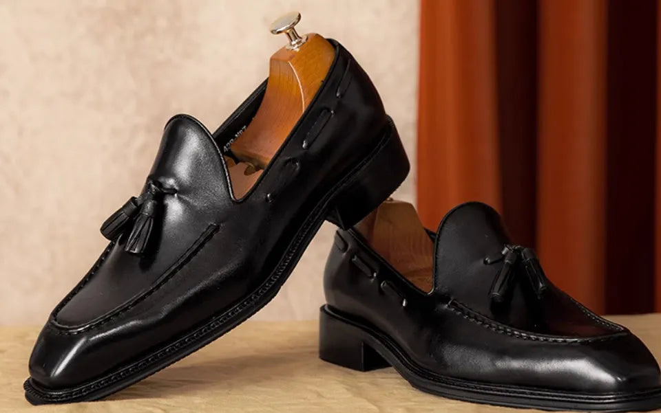 Men's black genuine leather slip-on loafers with rubber sole and British style design