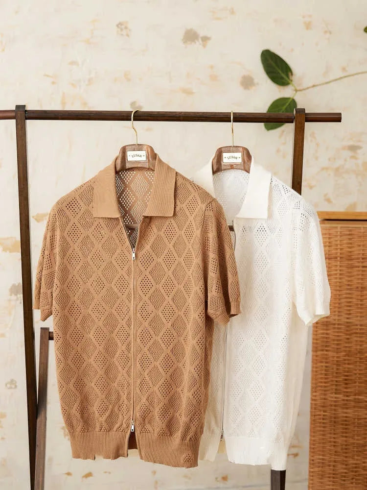 Light brown cotton cardigan with front zip and lapel collar on a hanger