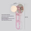 Simple glass ball bedroom wall lamp with black base and milky white chain, warm LED light