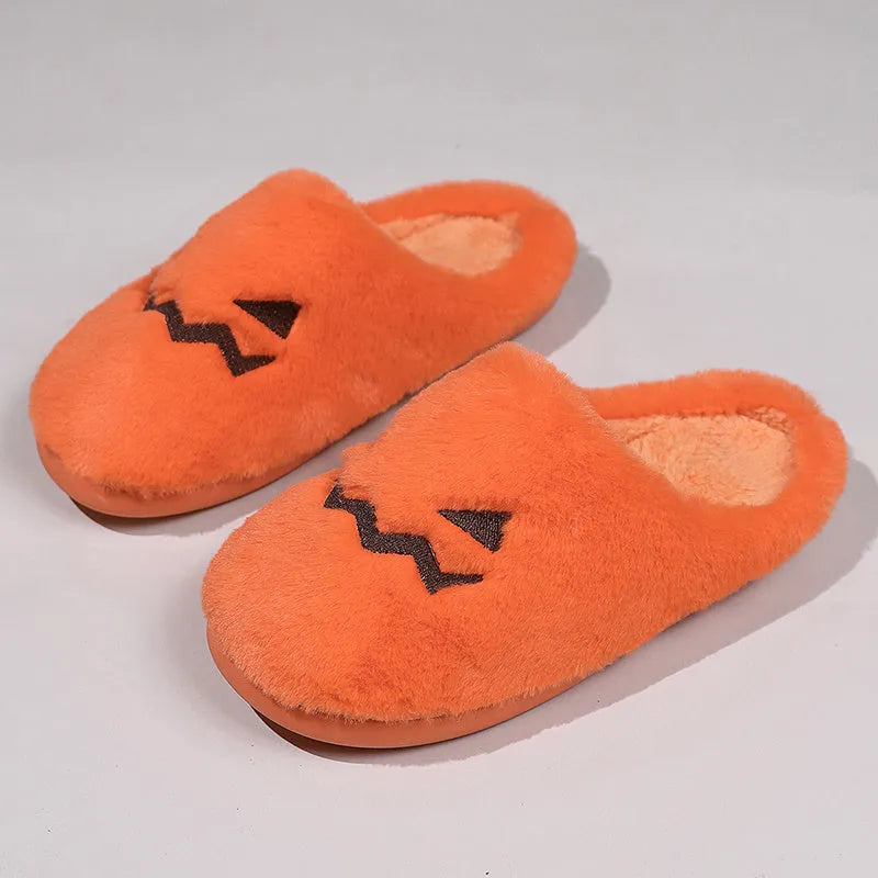 Orange Halloween pumpkin design plush slippers with coral velvet upper and flat PVC soles