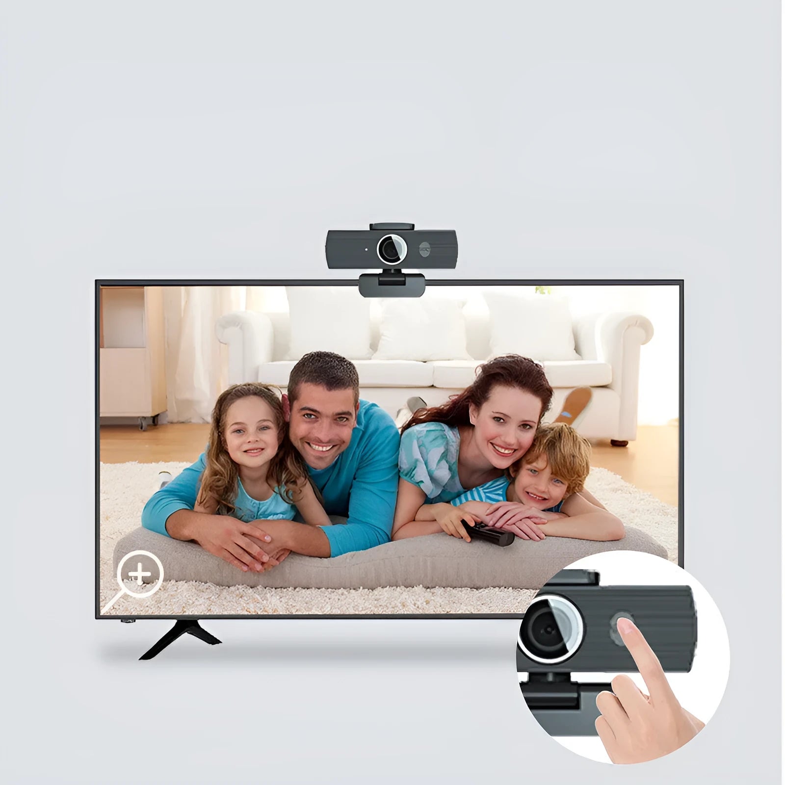 Black USB computer webcam with magnetic privacy cover on a desktop