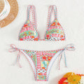 Women's lace-up front one-piece swimsuit with split leg design in polyester fabric