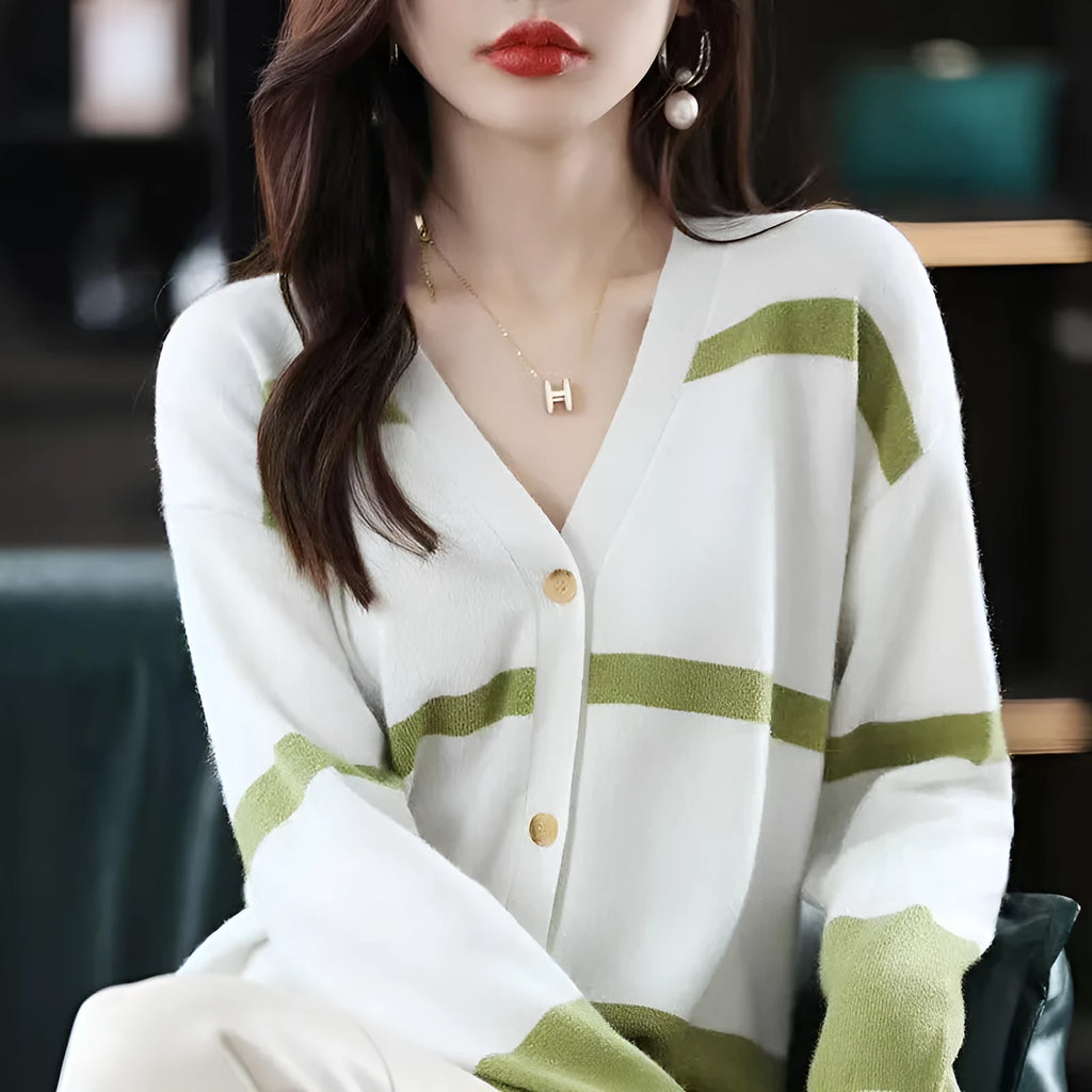 Women's striped V-neck knitted cardigan in a slim fit, showing 3D pattern detail.