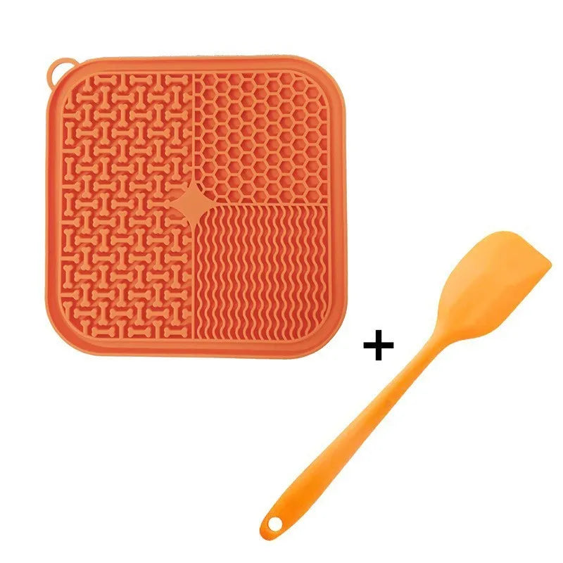 Blue silicone dog licking mat with textured surface and suction cups on back