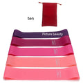 Five-piece yoga tension strap set in TPE fabric in solid colours green blue yellow red and black