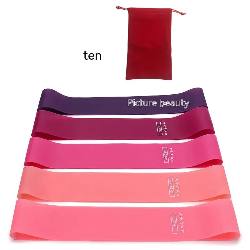 Five-piece yoga tension strap set in TPE fabric in solid colours green blue yellow red and black