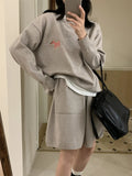 Women's milk blue knitted sweater and shorts casual suit with animal embroidery.