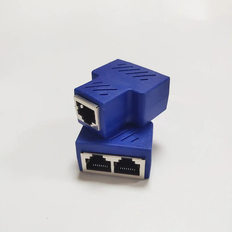 Two white RJ45 network cable splitter adapters showing one input and two output ports.