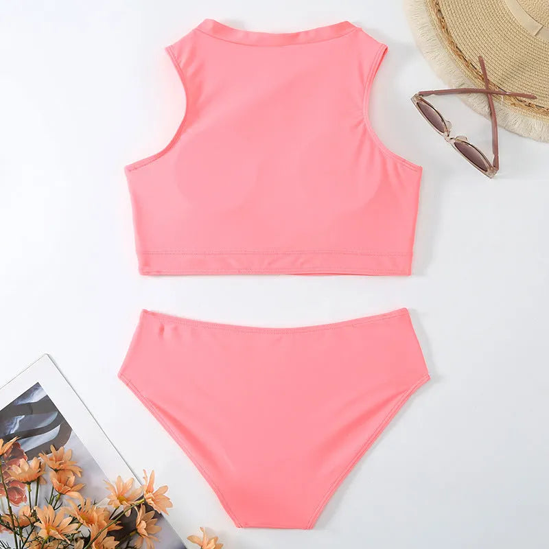 Pink high waist split bikini swimsuit on a mannequin, showing the briefs style and solid colour.