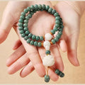 Bodhi seed bead bracelet with double ring safety buckle in White Jade colour, unisex design