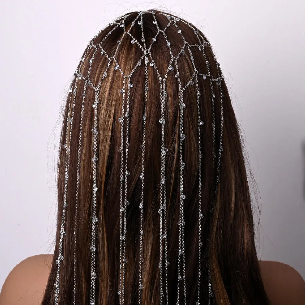 Gold rhinestone mesh headband with decorative tassel for women.