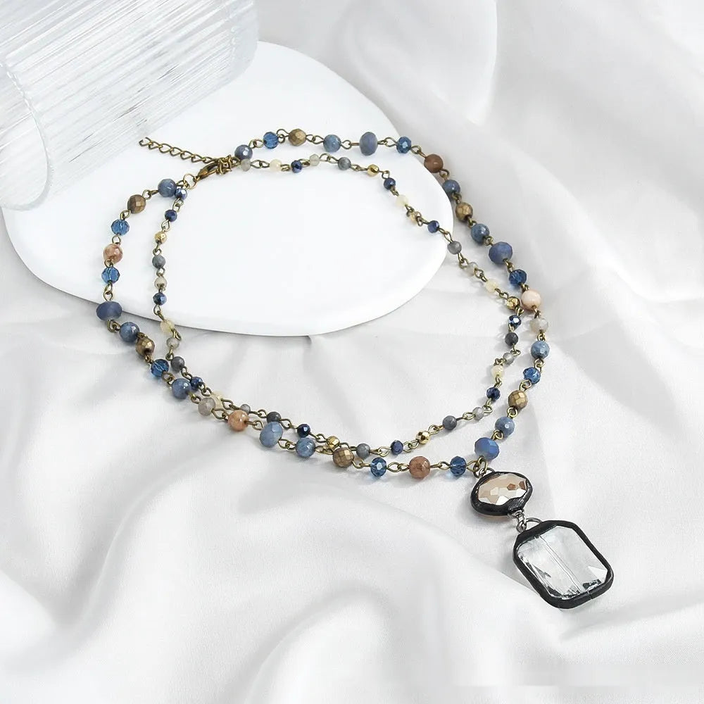 Tribal style necklace with glass and natural stone pendant on two-layer alloy chain