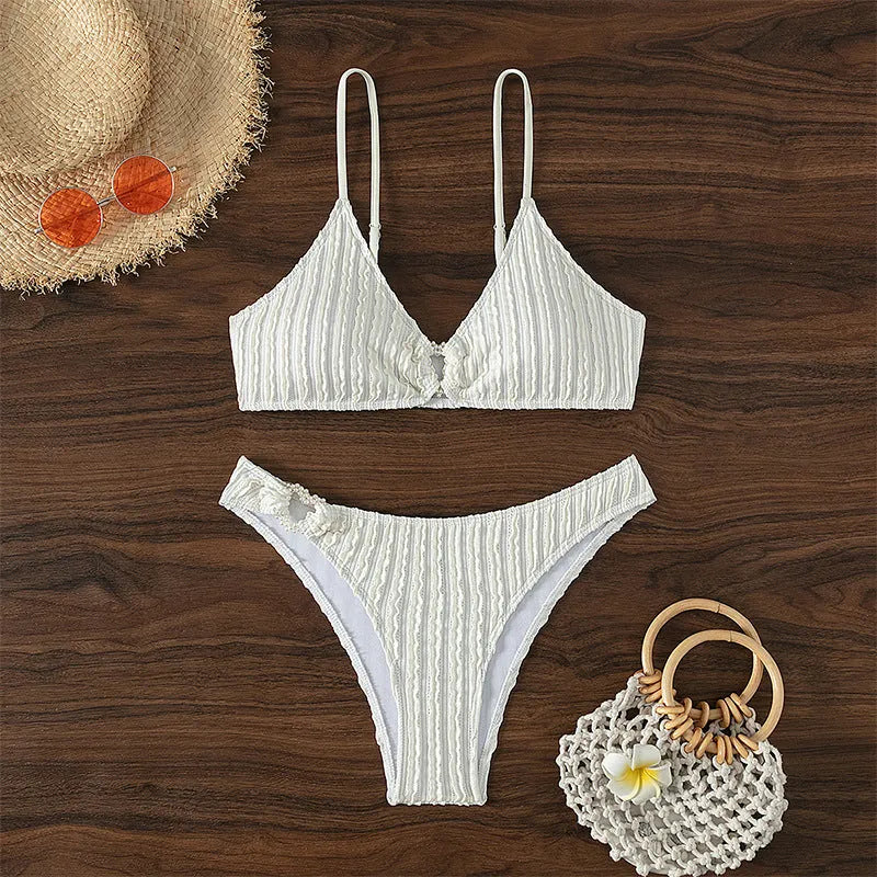 White women's V-neck swimsuit with split shorts for beach swimming
