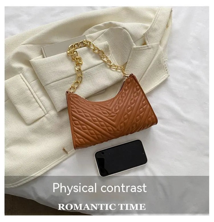 Pleated chain strap baguette shoulder bag in vertical square shape with soft PU leather exterior