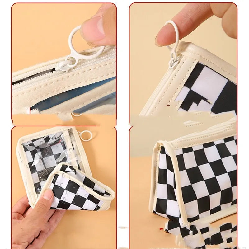 Transparent PVC pencil case with chessboard grid pattern showing pens inside, 21.5cm long