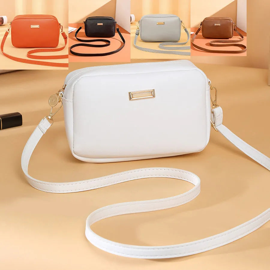 Women's solid colour PU shoulder bag with three-dimensional pockets and horizontal square shape