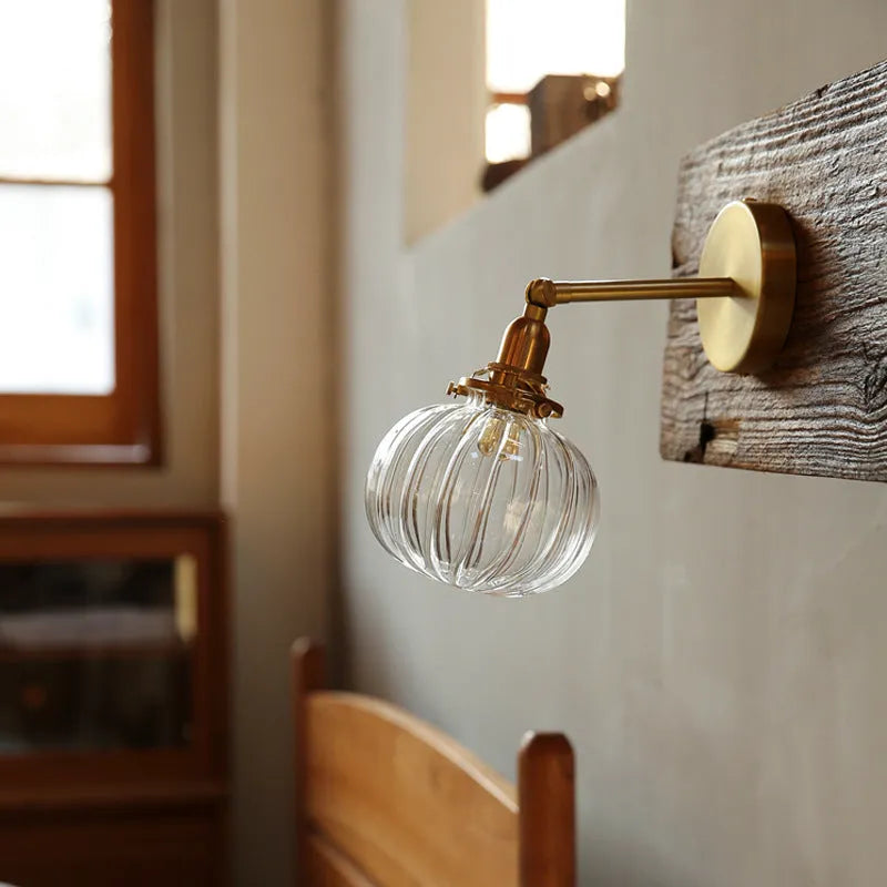 Pumpkin-shaped glass wall lamp with water ripple transparent finish for living room or bedroom