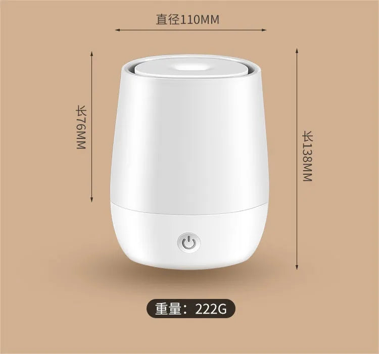 White USB aromatherapy diffuser with simulated flame effect showing mist emission