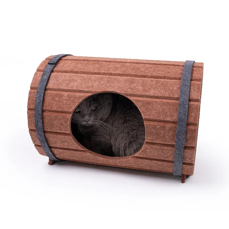 Assembled wine barrel pet bed in polyester fibre felt with binding straps, designed as a cosy cat nest