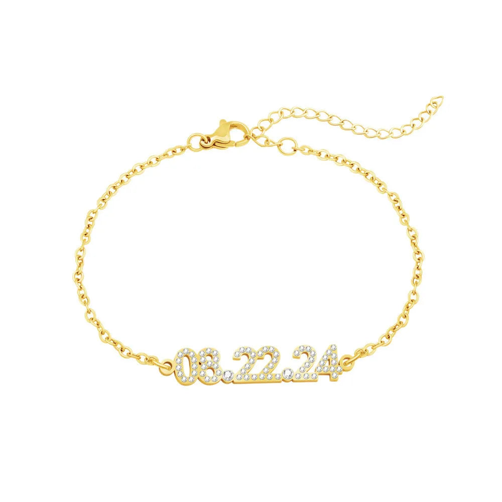 Stainless steel digital bracelet with diamond-set numbers on display, shown in gold tone.
