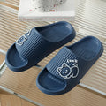 Women's green EVA flip-flop slippers with cute cat design and thick platform sole.