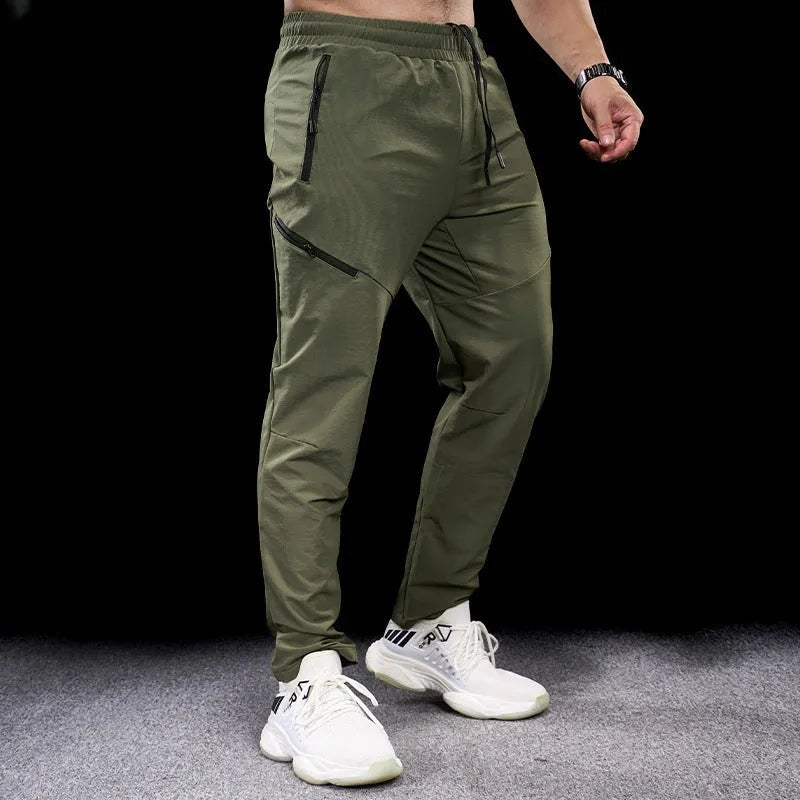 Men's waterproof quick-dry workout trousers in nylon fabric showing colour options