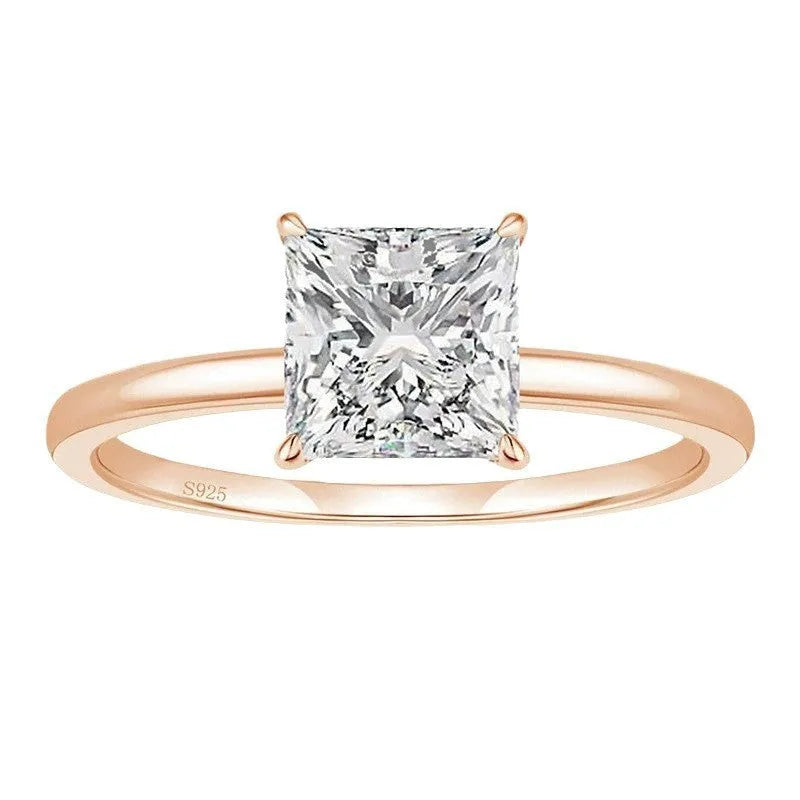Women's simple geometric sterling silver ring with round zirconium stone in silver, gold, or rose gold colour.