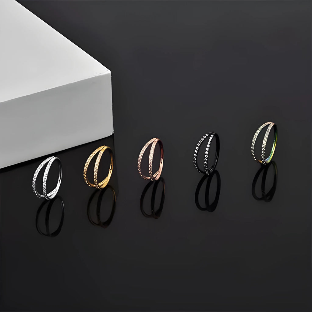 G23 titanium alloy puncture-style lip and nose ring in steel colour or gold finish.