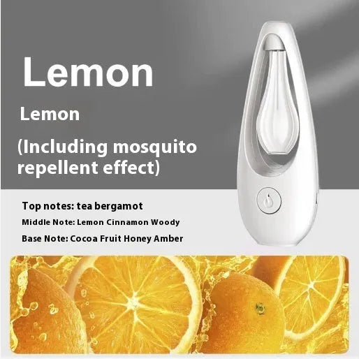 Ultrasonic aroma diffuser with mosquito repellent in a compact plastic design on a table, with essential oil bottle beside it