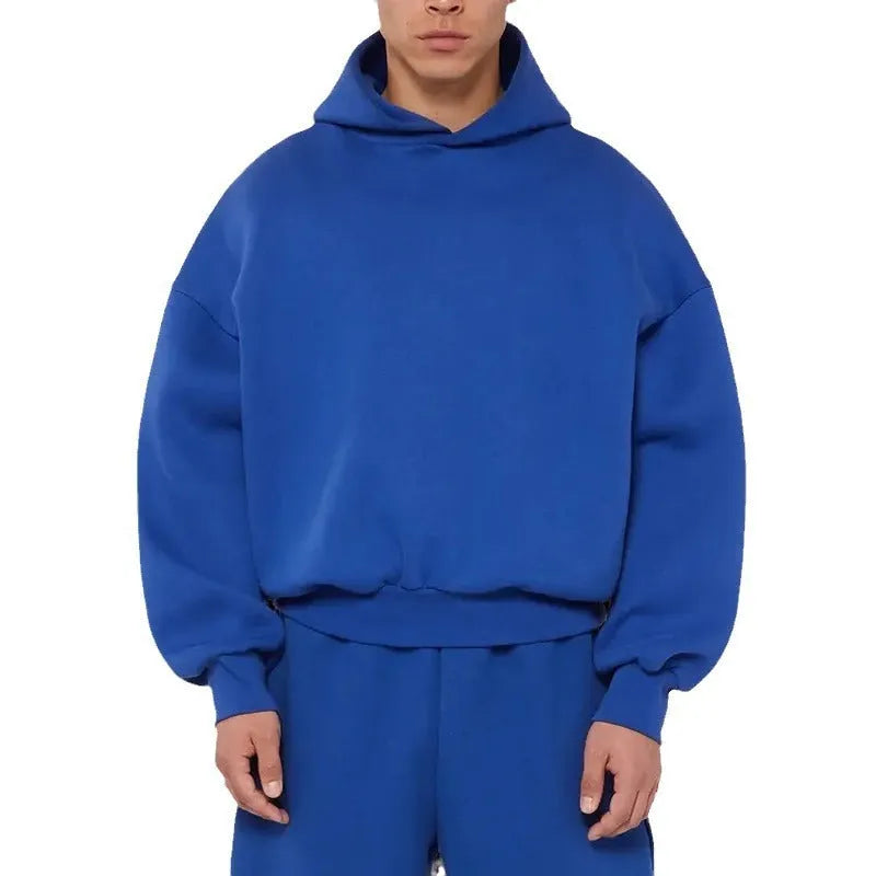 Man wearing a solid-colour fleece-lined cotton hoodie with wool lining.
